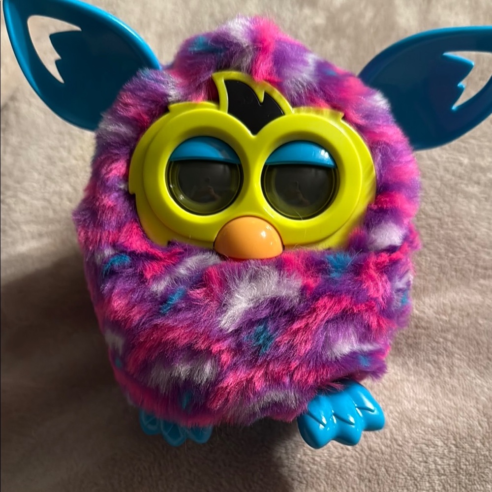 Interactive Plush Toy with Pink and Blue Fur